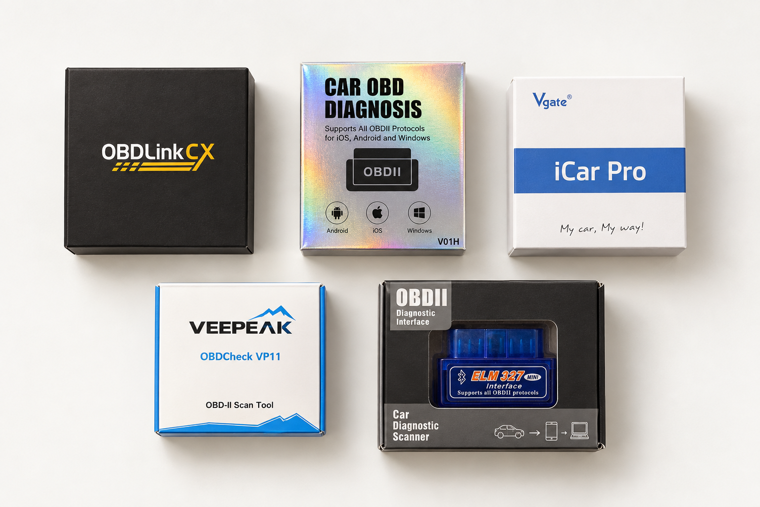 Boxed OBD adapters on the Scout workbench, including OBDLink, Veepeak, and Vgate models.